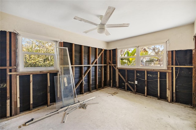 misc room with a ceiling fan and a wealth of natural light