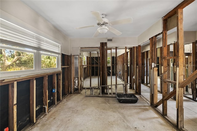 misc room featuring visible vents and ceiling fan