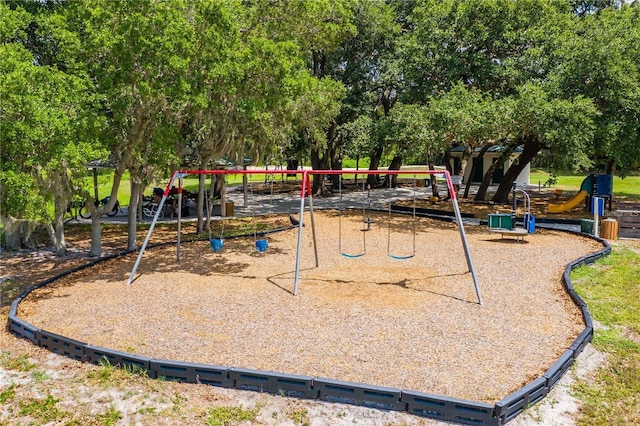 view of property's community with playground community