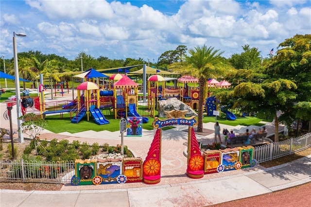 communal playground featuring fence