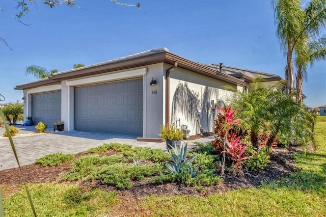 exterior space with decorative driveway