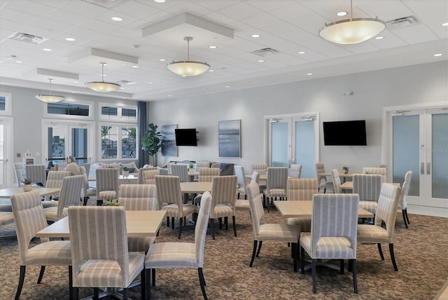 dining area featuring recessed lighting, visible vents, carpet flooring, and french doors