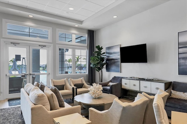 living area with recessed lighting and french doors