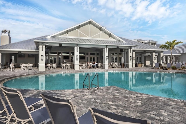 community pool featuring a patio