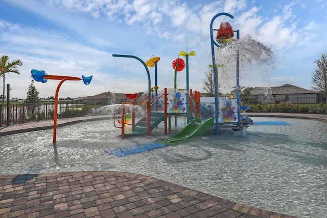 community playground featuring fence