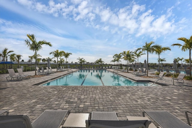 pool with a patio area