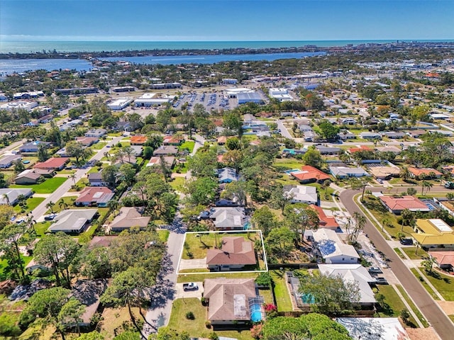 aerial view featuring a water view and a residential view