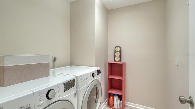 laundry area with washing machine and dryer and laundry area