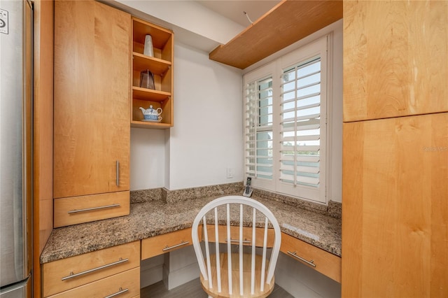 interior space featuring built in desk