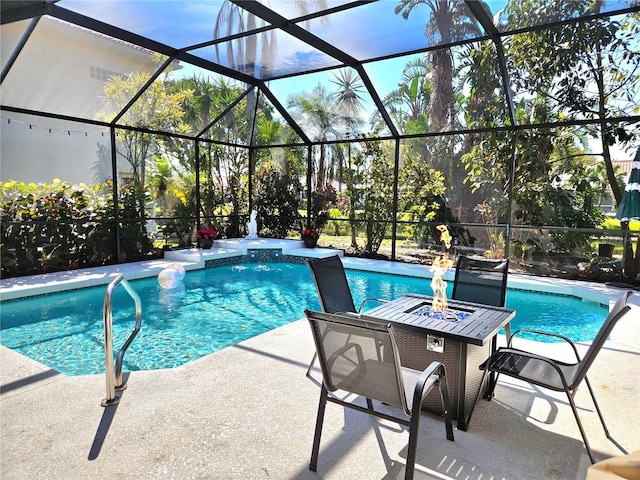 pool with a patio and a lanai