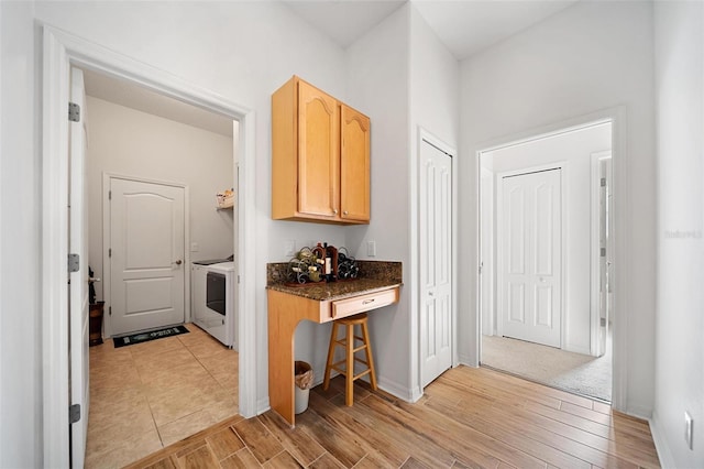 2114 147th Ct E, Bradenton, FL 34212 - hall with washer and clothes dryer, light wood-type flooring, and baseboards