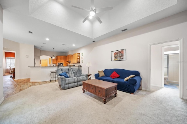 2114 147th Ct E, Bradenton, FL 34212 - living room featuring visible vents, ceiling fan, recessed lighting, and light colored carpet