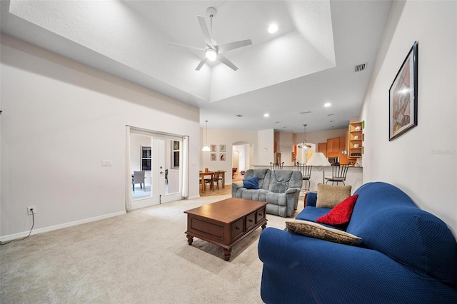 2114 147th Ct E, Bradenton, FL 34212 - living area featuring arched walkways, light colored carpet, a ceiling fan, visible vents, and french doors
