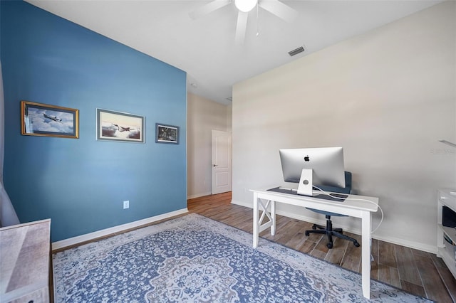 2114 147th Ct E, Bradenton, FL 34212 - office with visible vents, ceiling fan, wood finished floors, and baseboards