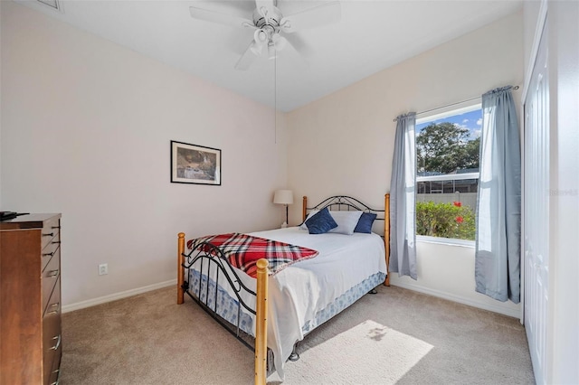 2114 147th Ct E, Bradenton, FL 34212 - carpeted bedroom featuring ceiling fan and baseboards