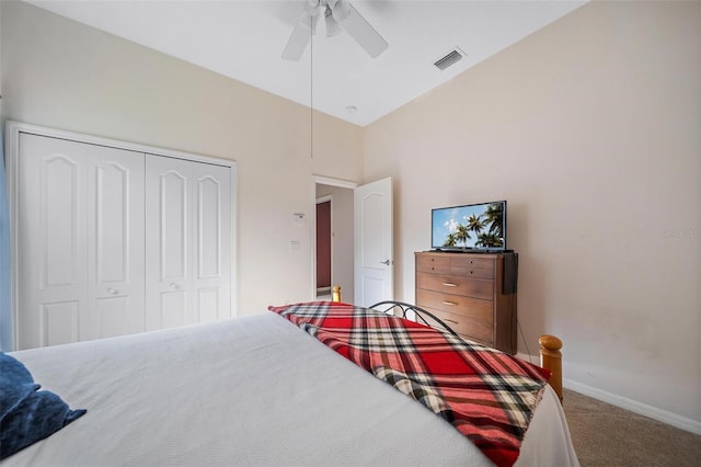 2114 147th Ct E, Bradenton, FL 34212 - bedroom featuring high vaulted ceiling, carpet, a closet, visible vents, and baseboards