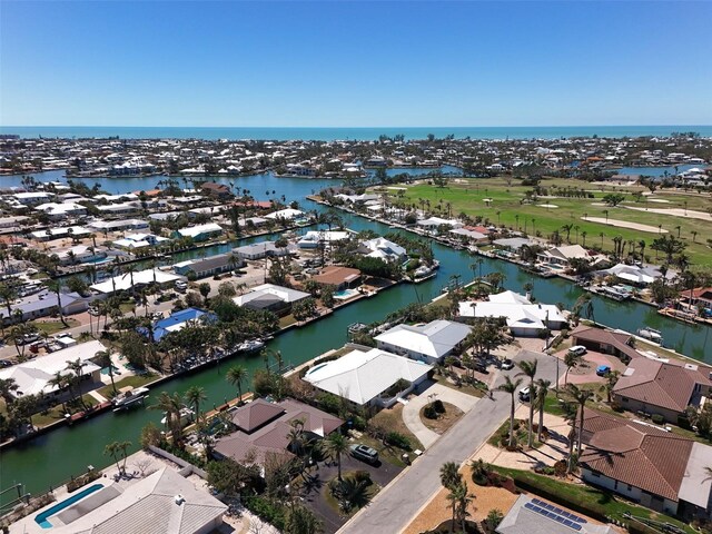 aerial view with a residential view and a water view