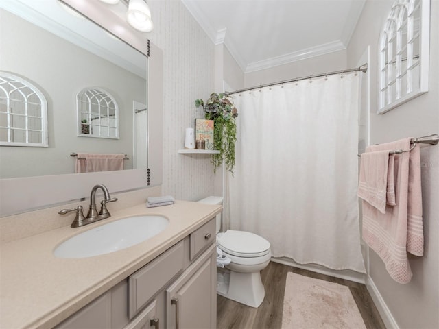 full bath featuring wood finished floors, toilet, ornamental molding, and vanity