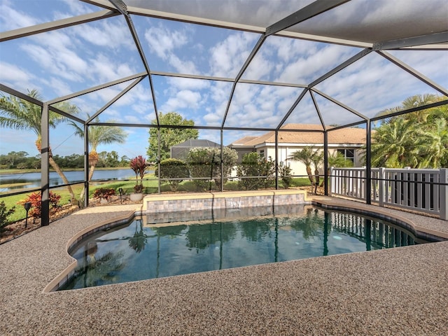 outdoor pool with a water view, a lanai, and a patio area