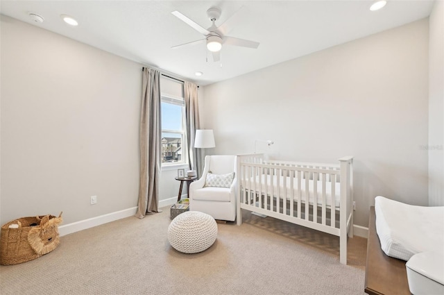 carpeted bedroom with a ceiling fan, recessed lighting, and baseboards