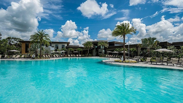 community pool featuring a patio area