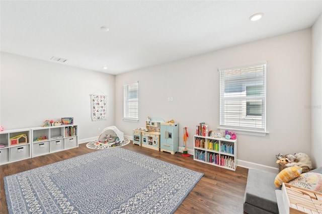 game room with visible vents, recessed lighting, baseboards, and wood finished floors