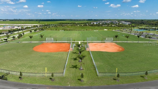 birds eye view of property featuring a rural view