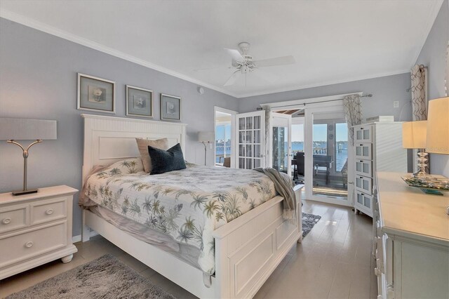 bedroom featuring a ceiling fan, wood finished floors, ornamental molding, access to exterior, and french doors