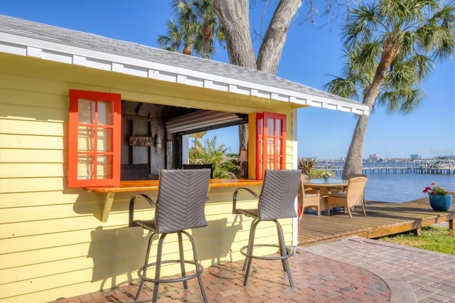 view of patio / terrace featuring outdoor dry bar