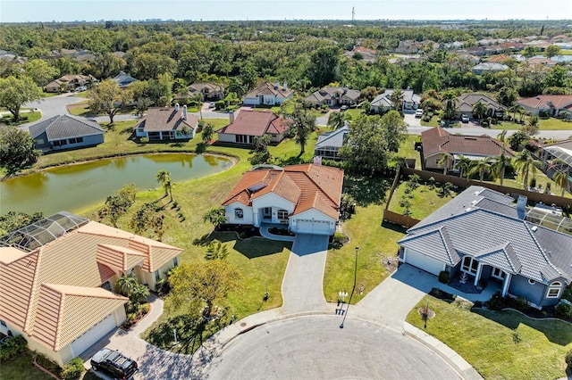 aerial view featuring a residential view and a water view