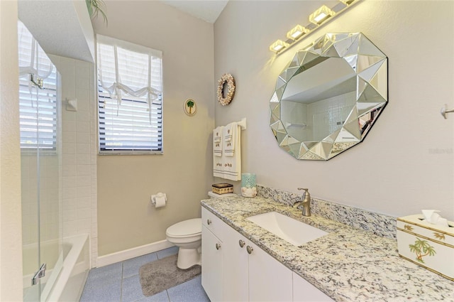 full bathroom with baseboards, toilet, vanity, and tile patterned flooring