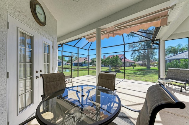 sunroom with a residential view