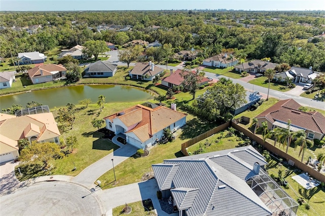 birds eye view of property featuring a residential view and a water view