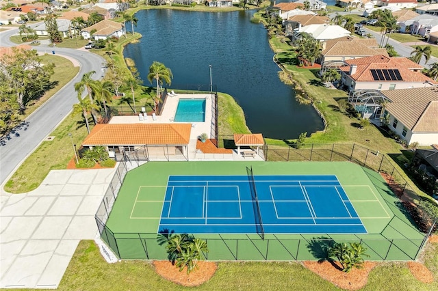 aerial view with a residential view and a water view