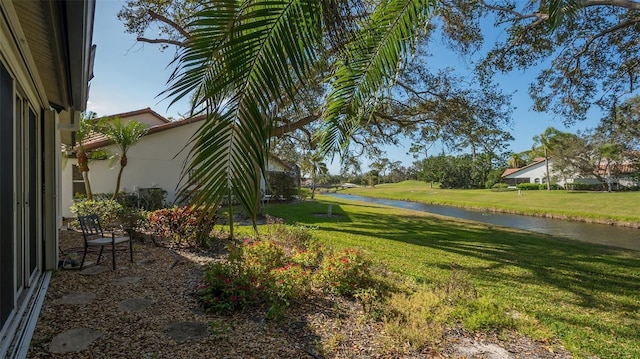 view of yard featuring a water view