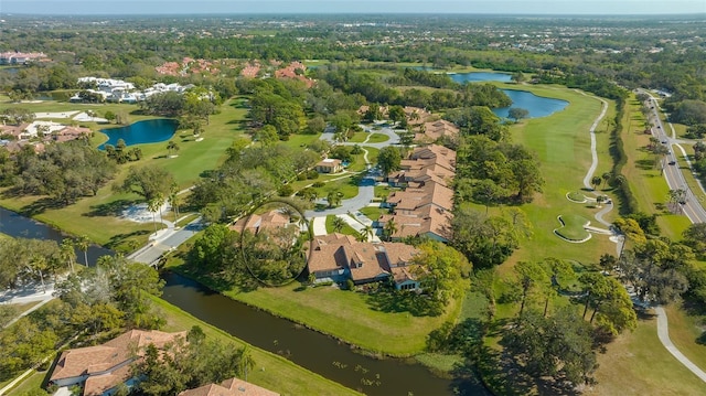 aerial view with view of golf course and a water view