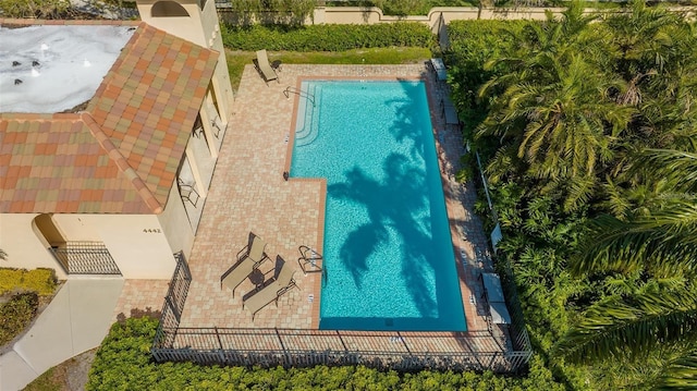 view of pool featuring a fenced in pool and a fenced backyard