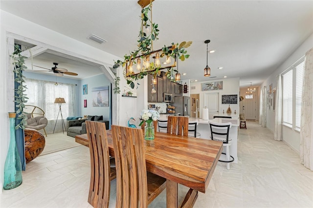 dining room with recessed lighting, visible vents, and ceiling fan with notable chandelier