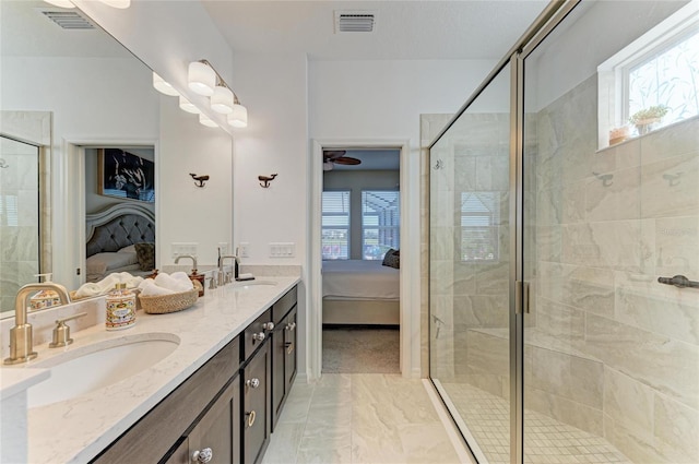 ensuite bathroom with visible vents, ensuite bathroom, and a sink