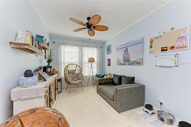 living area featuring wood ceiling, baseboards, and ceiling fan