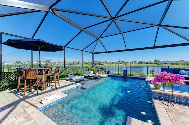 view of pool featuring a lanai, a patio area, and fence