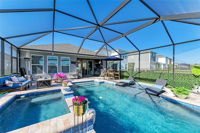 outdoor pool featuring a patio, ceiling fan, outdoor lounge area, and fence