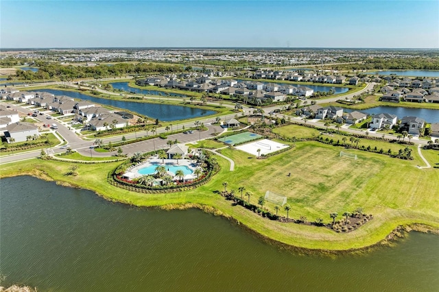 aerial view with a residential view and a water view