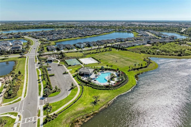 aerial view with a residential view and a water view