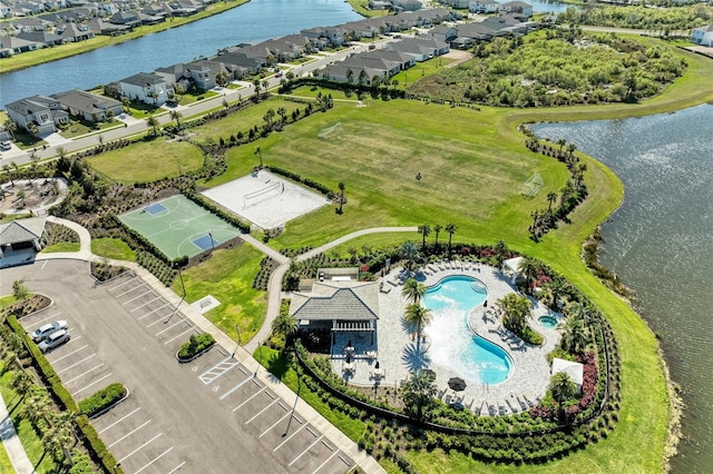 aerial view with a residential view and a water view