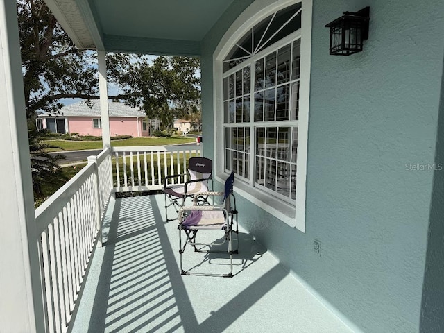 balcony featuring covered porch