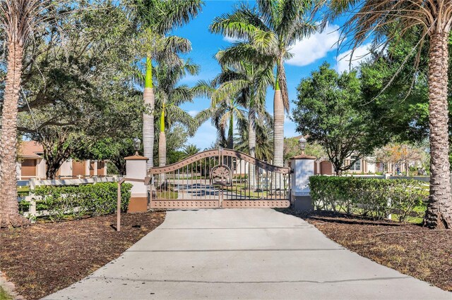 3551 Ridgeland Ct, Punta Gorda, FL 33982 - view of gate featuring fence