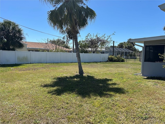 view of yard with fence