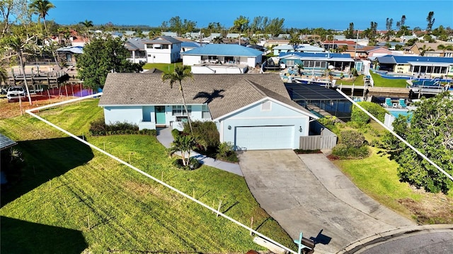 birds eye view of property with a residential view