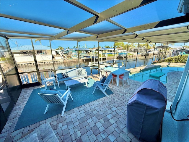 view of patio / terrace with glass enclosure, a water view, a grill, and a boat dock